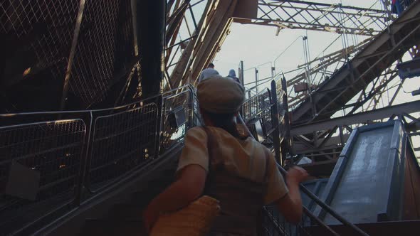 Young woman climbing the stairs