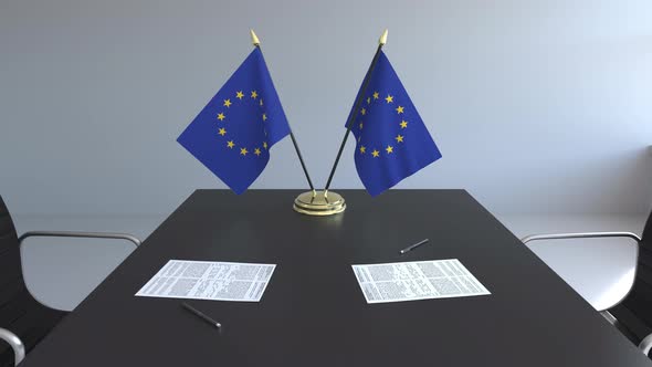 Flags of the European Union on the Table