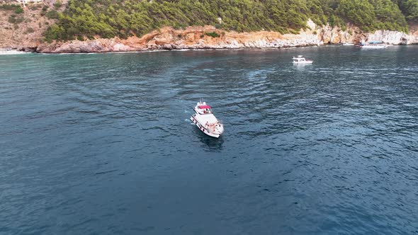 A large yacht stands at sea aerial view 4 K