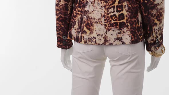 Mannequin in Leopard Jacket Turning.