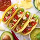 Tasty Mexican Meat Tacos Served with Various Vegetables and Salsa - VideoHive Item for Sale