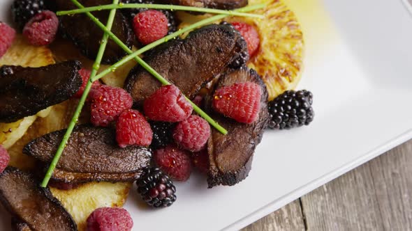 Rotating - smoked duck bacon with grilled pineapple, raspberries, blackberries and honey