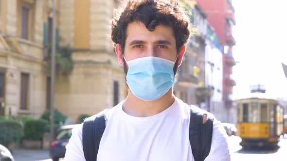 Man wearing protective mask in city