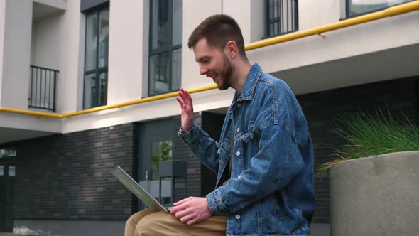 Young Caucasian Man Doing Video Call Outside