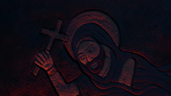Wall Art Of Saint With Crucifux In Candlelight