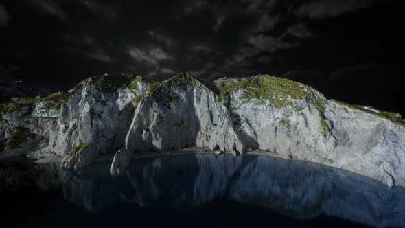 Fjord with Dark Storm Clouds