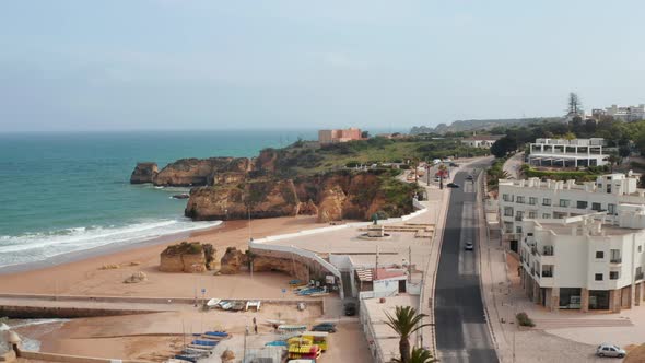 Aerial Drone View of Scenic Portuguese Beach Coastline in Lagos Algarve Flying Sideway Reveal