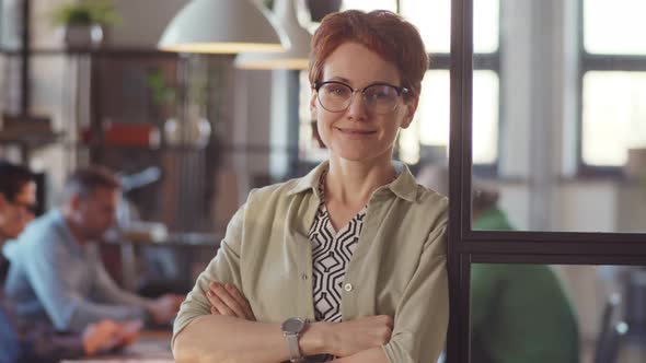 Portrait of Cheerful Businesswoman in Office