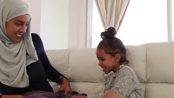 Mother and daughter at home