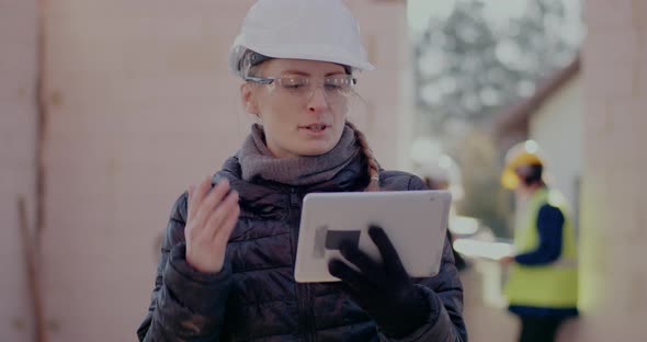 Confident Young Female Building Contractor on Video Call