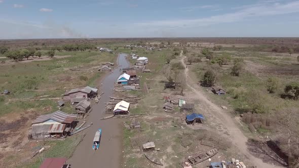 Aerial view of canal crossing between neighborhood, Tonle Sap, Cambodia.