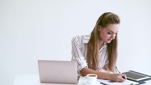 Blonde Business Woman Working at Modern Office