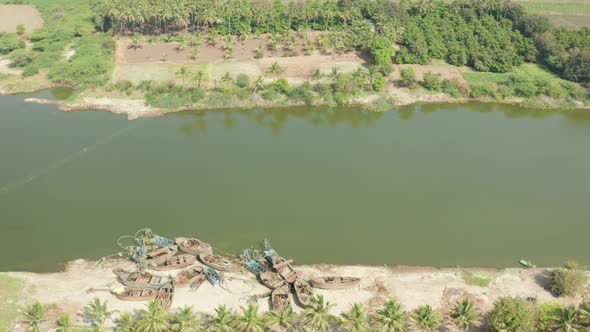 Coconut Plantation Near The River At The Countryside In Maharashtra, India -aerial drone