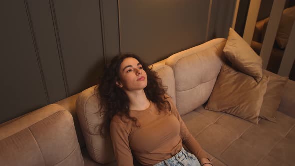 Attractive Young Woman Resting on Couch Healthy Calm Lady Relaxing on Comfortable Sofa Napping Feel