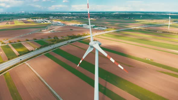 Aerial View of Wind Turbines Farm and Agricultural Fields. Austria