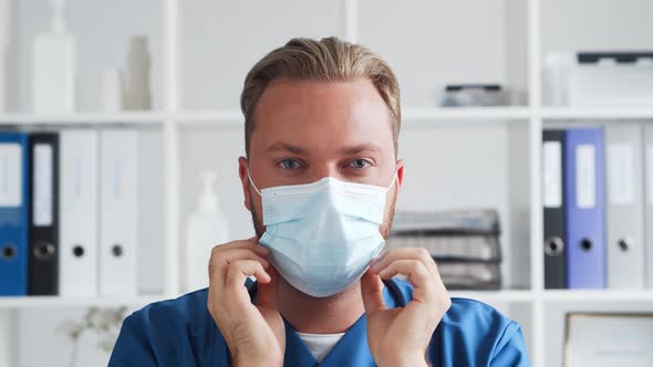 Professional medical doctor in hospital office, Portrait of young and confident physician.