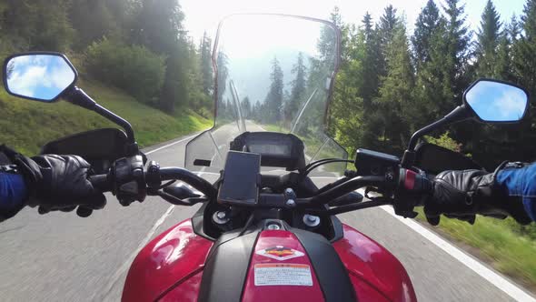 POV Biker Rides on Motorbike By Scenic Green Mountain Road Swiss Alp Moto Trip