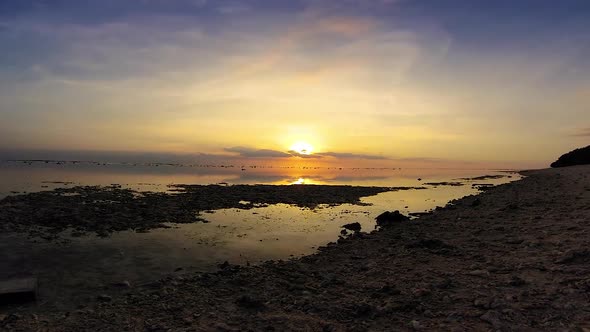 TimeLapse - Beautiful sunset over ocean as seen from Gili Islands, Indonesia.