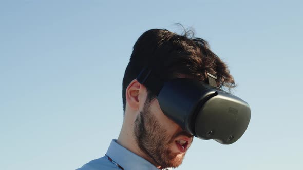 Business Guy with Shirt and Augmented Reality Headset Outdoors