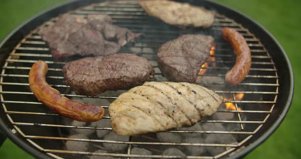 Grill Grid With Steak And Sausages