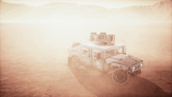 Military Patrol Car on Sunset in Desert Storm alt