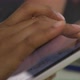 Extreme close up of business woman's hands using tablet computer - VideoHive Item for Sale