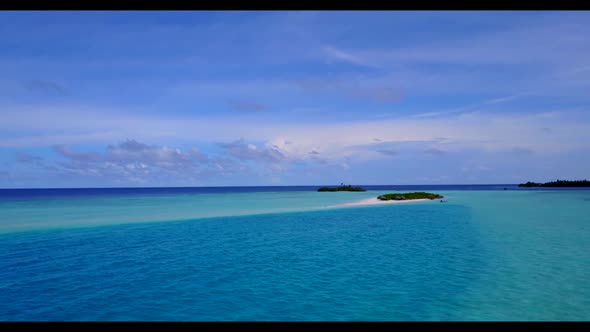 Aerial top down scenery of exotic lagoon beach voyage by aqua blue sea and white sand background of 