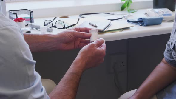 Doctor examining a senior woman in a retirement home