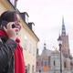 Happy Asian woman wearing winter outfits standing and having a call in town - VideoHive Item for Sale