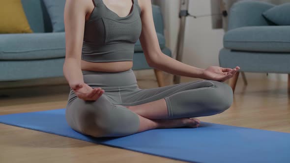 Athletic Female Meditating During Workout On Yoga Mat At Home. Healthy Lifestyle, Fitness