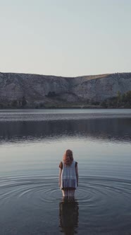 woman walking in lake water