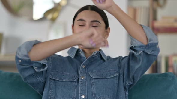 Latin Woman Listening Music Dancing on Sofa