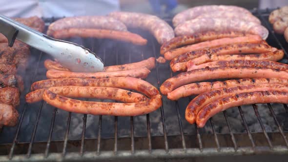 Grilled Sausage with the Addition Vegetables on the Grill Plate