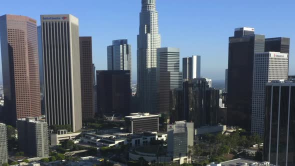 AERIAL: Wide View of Downtown Los Angeles, California Skyline at Beautiful Blue Sky and Sunny Day 