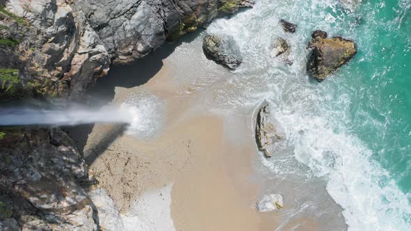  Aerial View on Wild Tropic Beach, Waterfall, Light-green Ocean and Sea Rocks