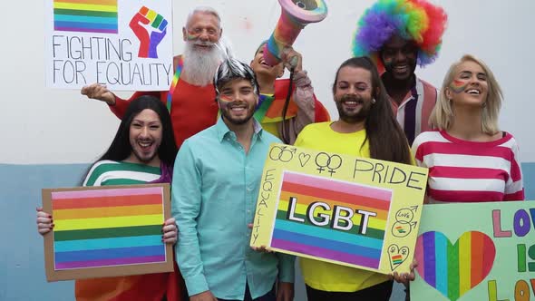 Happy Multiracial people celebrating gay pride event