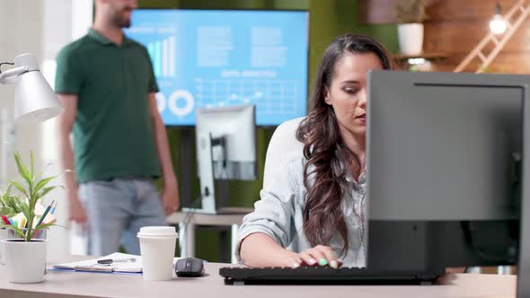 Revealing Shot of Woman Working in Cozy Office