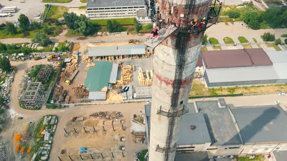 Aerial View Man Jumps From an Extremely High Height Upside Down