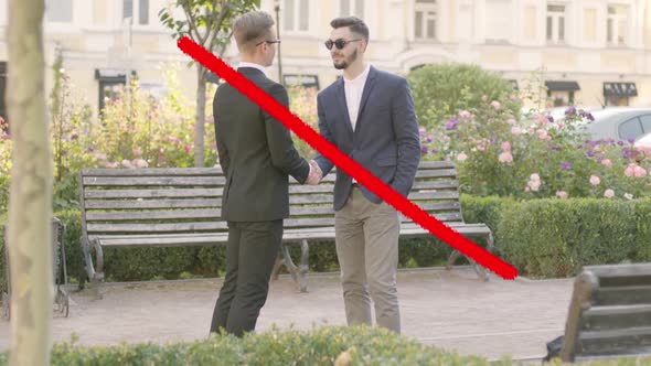 Two Young Caucasian Businessmen Shaking Hands As Red Lines Crossing Their Greeting and 6.5 Feet