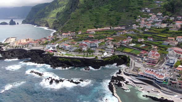 Flying over Porto Moniz town in northern Maderia, Portugal