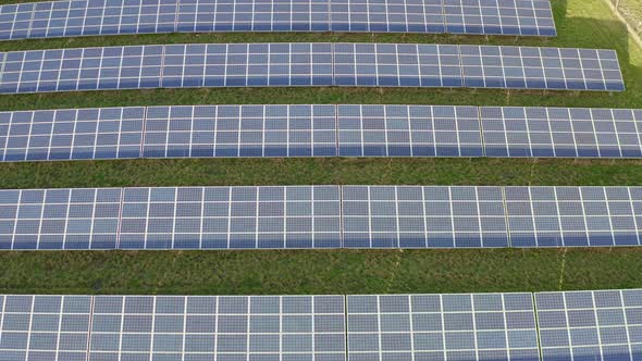 A solar farm in Staffordshire, thousands of Solar Panels capturing the sun's natural light and conve