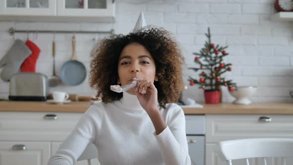 Lady Blows Silver Paper Pipe and Shows Birthday Present Box