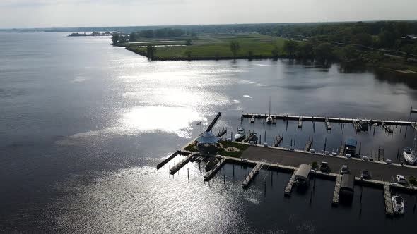 Sun Shining on the Coast of Muskegon Lake near the Marina.