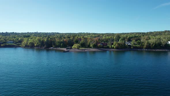 Zooming out shot of the lake superior shoreline near Duluth, MN