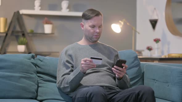 Casual Man Unsuccessful Online Payment on Smartphone