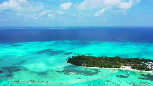 Aerial top down nature of marine shore beach break by aqua blue sea and white sandy background of a 