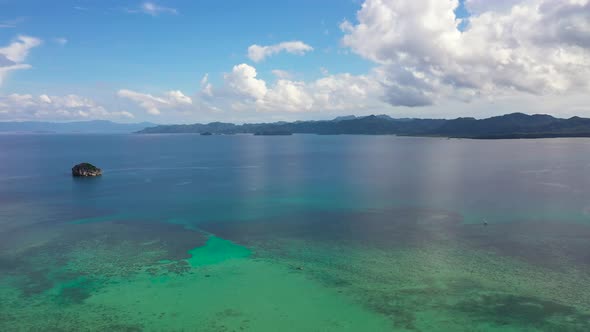 Seascape with Beautiful Sky and Islands. Tropical Islands, Top View. Turquoise Sea with Coral Reefs.