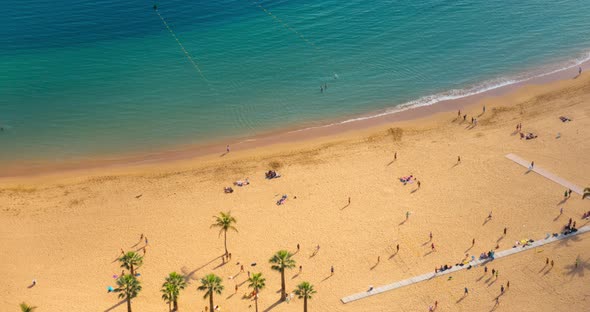 Aerial Timelapse of People on Teresitas Beach Tenerife Canary Island