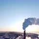 Chimneys of a Factory or Power Plant Produce Smoke at Sunrise Aerial View From a Drone - VideoHive Item for Sale