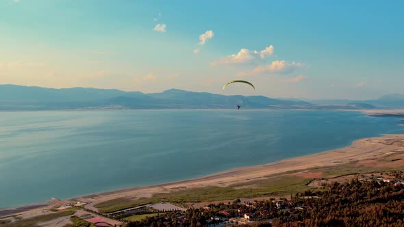 Paragliding Over Mountains Near City